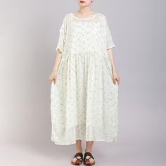 Round Neck Print Floral Pleated Short Sleeve Dress - Omychic Casual Loose Maxi Dress For Spring, Casual Loose Summer Maxi Dress, Casual Loose Maxi Dress For Summer, Green Loose Spring Dress, Loose Green Spring Dress, Loose Spring Vacation Dresses, Casual Loose Maxi Dress, Loose Green Summer Dress, Beige Shift Dress For Spring