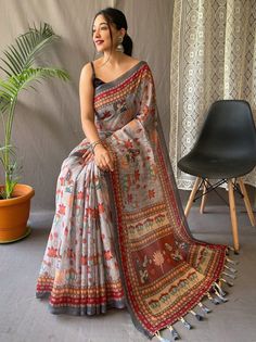 Charm your way through any gathering with the elegant and splendid Perfect Ash-Grey Kalamkari Print Cotton Occasion Saree with Blouse. Crafted from smooth and pure malai cotton, this saree is designed with intricate kalamkari prints, giving your traditional look a stylish twist. The ash-grey palette of this saree is truly stunning and is complemented with a contrasting pallu and cute tassels, tying the entire ensemble together beautifully.
Measuring 5.50 meters, this saree provides ample fabric Kalamkari Prints, Saree Cotton, Grey Saree, Sky Blue Color, Kalamkari Saree, Kanjivaram Sarees, Printed Saree, Contrast Blouse, Traditional Attire