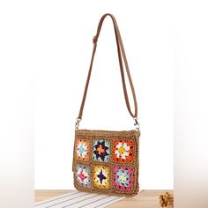 Embrace Nature With A Charming Flower Pattern Experience The Artistry Of Straw Woven Craftsmanship Versatile Size Of 27*1*21cm For Daily Essentials Enjoy The Comfort Of An Adjustable Shoulder Strap Brand New In Packaging Trendy Brown Square Straw Bag, Trendy Brown Crochet Bag With Adjustable Strap, Summer Brown Shoulder Bag With Mobile Phone Bag, Brown Crossbody Straw Bag With Phone Holder, Brown Crossbody Straw Bag With Mobile Phone Holder, Brown Square Satchel For Vacation, Brown Square Shoulder Bag For Spring, Summer Style Brown Shoulder Bag, Brown Woven Square Shoulder Bag