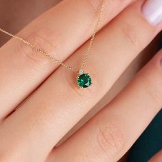 "Our single diamond tiny round emerald necklace is an elegant jewel to wear whenever you want. A meaningful gift that can be given as a birthday gift to those born in May 🤍🤍 Special gifts for your special moments. We produce our jewelery for you in the most perfect way. 🤍🤍 All of our products are carefully crafted from 14k Solid gold and Real diamonds. FEATURES * Made to order. * Gold Color Selection: Yellow Gold, Rose Gold, White Gold * Gold KT: 14K * Length: 14\", 16\", 18\", 20\", 22\",24 Emerald Jewelry Necklace Gold, Fine Jewelry Solitaire Necklace For May Birthstone Gift, May Birthstone Solitaire Necklace Gift, Elegant Emerald Necklace With Prong Setting As Gift, May Birthstone Gift Solitaire Necklace With Round Pendant, May Birthstone Solitaire Necklace For Anniversary, Anniversary Solitaire Necklace With May Birthstone, Minimalist Emerald Necklace For Anniversary, Minimalist Brilliant Cut Birthstone Necklace As Gift