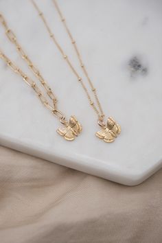 Details: - 14K Gold Filled Satellite chain - 18K Gold Filled Paperclip chain - Pendant size: Approx. 12.5mm X 11mm - Pendant material: 18K Gold Plated over copper Get our Butterfly combo set here: https://www.etsy.com/listing/1495802464/gold-butterfly-necklace-set-simple?click_key=ba3bd1b7a421d42203ecb90840799789ea620d92%3A1495802464&click_sum=6f495841&ref=shop_home_active_20&pro=1&frs=1&sts=1 Each item is individually placed on our MIKUKUMI leather card & cotton pouch.  What is Gold Filled? Gol Dainty Yellow Gold Butterfly Pendant Necklace, Elegant Gold Butterfly Charm Necklace, Delicate Yellow Gold Necklace With Butterfly Charm, Everyday Gold Butterfly-shaped Jewelry, Dainty Gold-plated Yellow Gold Butterfly Necklace, Dainty Gold Butterfly Jewelry, Dainty 14k Yellow Gold Butterfly Necklace, Delicate Yellow Gold Butterfly Necklace, Dainty Gold-plated Jewelry With Butterfly Charm