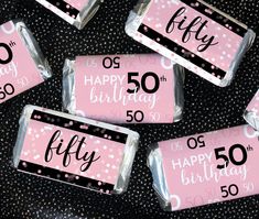 pink and black 50th birthday candy bar wrappers with polka dots on the top, set of five