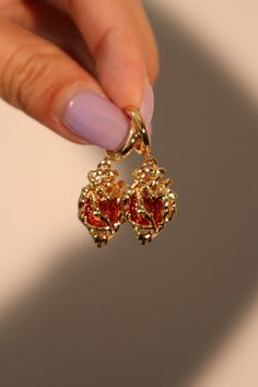 18K Gold Stainless Steel Red Heart Earrings – Cutethingscommin Red Crystal Earrings, Red And Gold Accessories, Gold Earrings Vintage, Cool Gold Earrings, Gold Jewelry Earrings Simple, Earring Outfit Ideas, Red And Gold Earrings, Gold And Red Jewelry, Prom Jewelry Gold