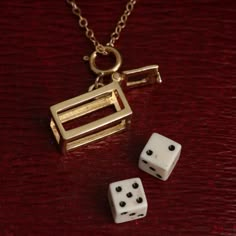 Keep a tiny set of vintage dice on hand for impromptu gambling sessions. The box-shaped charm's lid opens and snaps closed to keep the cubes safe and secure. These plastic/celluloid dice are vintage, probably made in the 1950's for just this purpose. (Dice charms were hugely popular in midcentury America). Their novelty hasn't worn off - wear our version as a talisman for good fortune. Vintage Dice, Fran Fine, Dope Jewelry, Funky Jewelry, Jewelry Lookbook, Dream Jewelry, Pretty Jewellery, Jewelry Inspo, Good Fortune