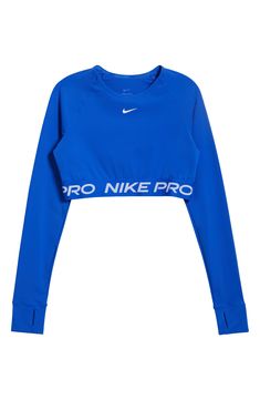 Nike Pro lettering details the stretchy, cropped hem of a second-skin top designed with sweat-wicking Dri-FIT tech that helps you stay dry and comfortable. 13" length (size Medium) Crewneck Long sleeves with thumbhole cuffs Dri-FIT moisture-wicking technology 83% polyester, 17% spandex Machine wash, dry flat Imported Nike Toos, Functional Sports Crop Top With Crew Neck, Functional Crew Neck Crop Top For Sports, Moisture-wicking Crew Neck Sports Crop Top, Moisture-wicking Crew Neck Crop Top For Sports, Go-dry Cropped Sports Top, Breathable Cropped Sportswear Tops, Supportive Cropped Sports Tops, Nike Athleisure Crop Top For Sports