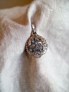 Formal White Gold Locket Jewelry, Antique Hallmarked Wedding Jewelry, Formal Filigree Medallion Jewelry, Ornate Hand Set Round Jewelry, Silver Oval Pendant With Vintage Charm, Antique Oval Pendant Jewelry With 17 Jewels, Silver Vintage Charm Oval Pendant Jewelry, Victorian White Gold Pendant Jewelry, Victorian Style White Gold Pendant Jewelry