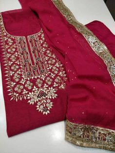 Item Overview ATHARVA Hand Embroidered Salwar Kameez/Chanderi Shirt/Reds/Gota Chiffon Dupatta/Custom Stitch Unstitch/Custom Anarkali/Plazzo/Pants Dno. CH1651 Fabric: * Shirt: Chander Silk - Embroidered Neck/ 2.5 Mts Beautiful Hand Embroidery * Dupatta: Chiffon Chinnon Dupatta 2.5Mts/ Latkans Tassels (Motifs may wary)/Exclusive Gota Patti work Border * Bottom Santoon Taffeta Silk 2.5 Mts. Excusive Hand Embroidered Party Wear Punjabi Suit. Customization: * Fabrics Customization: Designs Can be mad Sequin Kurti, Trendy Things, Patiala Salwar Kameez, Chanderi Suit, Partywear Suits, Anarkali Churidar, Embroidered Salwar, Salwar Pants, Pearl Work