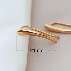 Lovely 24k gold cuff earrings in minimalist style. Look great on the ear, go under any style of clothing. What is Gold Vermeil Gold Vermeil - is genuine .925 sterling silver that has been expertly plated with a thick layer of 14k-24k gold. Advantages Gold Vermeil: * Base of high-quality sterling silver * A thick gold layer of at least 10k * Most of the time 14k-24k gold is used * Industry regulated gold thickness of no less than 2.5 microns (very thick). 24k Gold Plated Ear Climbers - Gold Ear C Minimalist Tarnish Resistant Ear Climbers For Everyday, Trendy Gold Ear Cuff With Matching Earrings, Trendy Gold Ear Climbers For Everyday Wear, Gold Ear Climbers For Everyday, Everyday Gold Ear Climbers, Minimalist Yellow Gold Plated Ear Climbers, Gold Plated Ear Cuff For Everyday Wear, Modern Gold Ear Climbers For Everyday, Gold Ear Cuff With Matching Earrings For Everyday