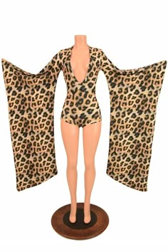 "This item is made to order, please read all the way through the listing before purchasing! This amazing romper is ready to turn heads! 50\" long kimono sleeves , and a plunging V neckline The stretchy Leopard print spandex is soooo cute! Womens Sizing (See below for instructions on where measurements should be taken) XXS: Bust 29\"-30\" / Waist 22\"-23\" / Hips 30\"-32\" Extra Small: Bust 31\"-32\" / Waist 24\"-25\" / Hips 33\"-35\" Small: Bust 33\"-34\" / Waist 26\"-28\" / Hips 36\"-37\" Mediu V Neck Romper, Cute Womens, Kimono Sleeves, Long Kimono, Kimono Sleeve, Really Cute Outfits, Fashion Line, Dream Clothes, Small Bust