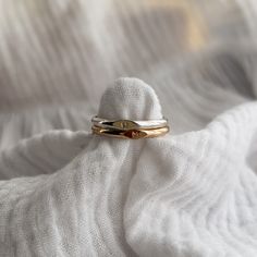 A timeless half round band, hand stamped with one little letter of your choice in our tiny lower or upper case font. Please ensure you type your personalisation exactly as you want it, as this is how we will stamp it. Available in 14K gold fill or sterling silver.   Not sure of your ring size? Grab one of our sizing tools with free delivery in Australia here: https://www.etsy.com/au/listing/1266045605/     As these pieces are handmade, each one is truly unique. You may notice a small join and a Minimalist Yellow Gold Stackable Rings With Initials, Simple Yellow Gold Stackable Initial Ring, Minimalist Stackable Yellow Gold Initial Ring, Adjustable Stackable Initial Ring, Minimalist Yellow Gold Signet Ring With Initials, Silver Ring Simple, Personalized Initial Ring, Ring Matching, Gold Rings Stackable