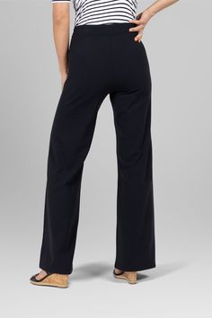 Why We Love This: Presenting our Natalie Sailor Pant —a harmonious blend of sophistication and versatility. Meticulously crafted with 4-way stretch fabric, this pull-on pant embodies effortless elegance and unparalleled comfort, elevating your style with every step. A modern twist on classic style, offering a flattering wide leg silhouette that elongates at every turn. Exude confidence and competence in our expertly designed work pants. Features: KiraGrace PowerStrong: Feels like cotton, keeps you dry High-rise, 32" inseam. Leg Opening: 23" Beautifully detailed gold button front Effortless elegant pull-on silhouette Made in USA of imported fabric Waist: High-Waisted (12" Rise) Inseam: 32" inseam, easy to hem Leg Shape: Wide leg pant Sizing: True to size Compression: Fitted through the hips Black Athleisure Bottoms With Pull-on Style, Versatile Black Pull-on Pants, Black Comfort Stretch Full Length Sweatpants, Black Wide Leg Athleisure Pants, Black 4-way Stretch Straight Leg Bottoms, Black 4-way Stretch Trousers, Full Length 4-way Stretch Sweatpants, Black Elastane Bottoms For Loungewear, Black Elastane Lounge Pants