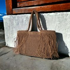 Boho Bag, Casual Shoulder Bag, Luxury Bag, Designer Bag, Fringe Bag, Knitted Raffia Beach Bag, Summer Bag, Big Crochet Bag, Straw Bag Any woman must have this bag for every fashionista. Whether you keeping it to yourself or gifting someone you care, it will be unforgettable. ✔️The interior of the straw summer bag has a magnetic button. Suitable for use as shoulder bag, beach bag or party bag. ✔️You can combine your clothes with a straw summer bag on summer days ✔️Bag base is felt supported and does not sag ✔️Handcrrafted in Turkey ✔️Hand-crocheted with care ✔️I made this beautiful bag from natural paper rope which is organic cotton. ✔️This bag is light weight yet durable, breathable and environmental at the same time. ✔️The bag has cotton lining. A lining of the appropriate color is sewn i Travel Straw Shoulder Bag With Fringe, Travel Shoulder Straw Bag With Fringe, Beach Rectangular Hobo Bag With Tassels, Beach Bags With Fringe In Rectangular Shape, Bohemian Crochet Bag With Fringe For Shopping, Rectangular Beach Bags With Fringe, Rectangular Crochet Bag With Tassels For Vacation, Rectangular Fringe Bags For Shopping, Vacation Rectangular Crochet Bag With Tassels