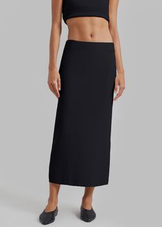 Color: Black Midweight Milano knit fabric Regular fit 
 Midi length
 Elasticated waist Slip-on style Unlined 58% Viscose 41% Polyamide 1% Elastane Machine Wash Cold By The Frankie Shop. Imported Classic Fitted Black Maxi Skirt, Fitted Black Classic Maxi Skirt, Black Stretch Full-length Pencil Skirt, Versatile Fitted Black Maxi Skirt, Elegant Full-length Stretch Pencil Skirt, Black Full-length Elastane Maxi Skirt, Stretch Full Length Pencil Skirt For Work, Black Fitted Skirt With Long Inseam, Fitted Black Skirt With Long Inseam