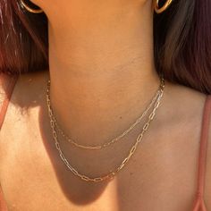 Introducing the Reema necklace – the perfect dainty and delicate piece for your layered necklace look. This necklace features a mini paperclip link chain design with an adjustable length so you can change it up each and every day. Simplicity and daintiness at its best with the Reema necklace! • Single Paperclip Chain• 18k Gold Filled• Chain Length: 18" + 1" extender (to make adjustable)• Link Chain Width: 1.8mm Minimalist Everyday Layered Link Necklace, Minimalist Link Layered Necklace For Everyday, Minimalist Double Chain Paperclip Jewelry, Trendy Gold Layered Necklace With Paperclip Chain, Trendy Necklace With Paperclip Chain, Minimalist Paperclip Necklace With Double Chain, Double Strand Paperclip Chain Layered Necklace, Trendy Layered Necklace With Paperclip Chain As Gift, Dainty Layered Necklace With Paperclip Chain