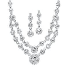 PRICES MAY VARY. LUXURY STYLE: Mariell Petite Size Glamorous Double Strand Rhinestone Necklace and Earrings Set, Double Strand Necklace with Matching Shimmery Dangles, Head Turning Bling PERFECT SIZE: Adjustable Statement Necklace for Petite Women Measures 12" to 16", Center of Necklace Measures 1 1/2" High , Graduated Earrings are 1 3/4" Long, Posts with Comfort Disc Backs QUALITY DESIGN: Stones are Top Quality Prong-Set Austrian Crystal Rounds Framed with Rhinestone Crystals MADE WITH LOVE: De Fashion Jewelry Editorial, Silver Prom Jewelry, Birdcage Veils, Jewelry Editorial, Feather Fascinator, Dramatic Style, Birdcage Veil, Bridal Fashion Jewelry, Indian Jewelry Sets