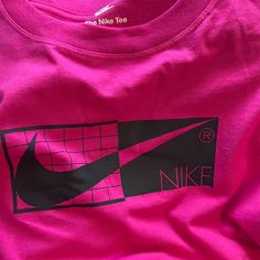 The Nike Tee Women’s T-Shirt Hot Active Pink Medium Nwt Nike Retro T-shirt With Letter Print, Retro Nike T-shirt With Letter Print, Nike Sporty Pink T-shirt, Vintage Nike Cotton Tops, Retro Nike Sports Tops, Nike Retro Tops With Letter Print, 90s Pink Logo Print Tops, Pink 90s Logo Print Tops, 90s Pink Tops With Logo Print