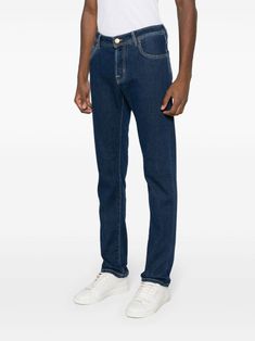 Find JACOB COHEN Mid-rise Slim-fit Jeans on Editorialist. indigo blue stretch-cotton denim logo patch to the rear belt loops at the waist classic five-pocket design slim cut front button fastening Blue Jeans With Five Pockets And Straight Hem, Classic Jeans With Belt Loops In Recycled Denim, Modern Blue Jeans With Straight Hem, Classic Blue Jeans With Belt Loops, Modern Denim Jeans With Welt Pockets, Modern Jeans With Welt Pockets, Classic Blue Jeans With Standard Cut, Casual Slim Fit Jeans With Welt Pockets, Modern Mid-rise Blue Jeans