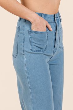 These high-waisted jeans are crafted from soft denim knit fabric, offering both comfort and flexibility. The straight wide leg fit creates a flattering silhouette, making them versatile for various occasions. Featuring front and back patch pockets for added style and functionality, they also have a zip fly with a button closure for a secure fit. Perfect for pairing with a fitted top or an oversized sweater, these jeans are a must-have addition to your wardrobe! Features: Washed, Pocketed Stretch