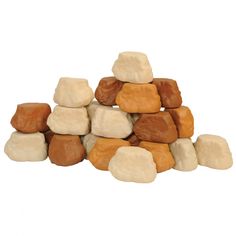 a pile of white and brown rocks sitting on top of each other