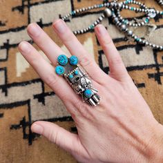 Authentic Turquoise set in Sterling Silver This Turquoise Kachina Ring was handmade by amazing Native American Artist Doris Smallcanyon. Size 8.75 2.25" long Collectible Blue Multi-stone Turquoise Ring, Unique Turquoise Ring Jewelry, Artisan Multi-stone Turquoise Ring, Southwestern Multi-stone Turquoise Jewelry, Collectible Turquoise Jewelry With Large Stone, Artisan Turquoise Collectible Rings, Turquoise Multi-stone Ring For Gift, Collectible Multi-stone Blue Turquoise Ring, Unique Turquoise Jewelry With Inlay