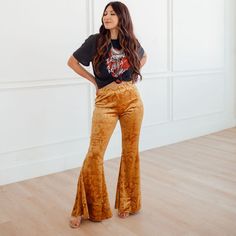 Add a chic twist to your wardrobe with the Golden Babe High Rise Velvet Flares Pants! A high banded waist tops these luxe stretch velvet pants with embossed pattern &, flared legs in a gold yellow. Pull on feature. Pair with a denim jacket and statement boots for a perfectly boho western look! Unlined. Color: Golden Yellow 30" Inseam 95% Polyester, 5% Spandex. Hand Wash Cold Wash Separately. Do Not Bleach. Lay Flat To Dry. Do Not Iron. Do Not Dry Clean. Velvet flare pants Velour flare pants Flar Boho Flare Pants Outfits, 70s Flare Jeans Outfit, Velvet Flare Pants Outfit, Velvet Trousers Outfit, Flares Outfit, Nicole Fashion, 60s Makeup, Flare Jeans Outfit, Statement Boots