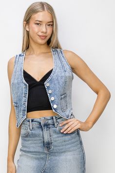 Take your denim game to the next level with the Risen Crop Denim Vest. Featuring a Western style and a length of 18 1/2", this vest is sure to add some edge to your wardrobe. Made with a blend of cotton, polyester, and spandex, this vest offers comfort and style. Size S fits chest sizes 33 1/2" due to its stretchy fabric. Crop Denim Vest, Wallet Bag, Cropped Denim, Sweater Blouse, Boot Sandals, Denim Vest, Western Style, Cropped Tank Top, Bag Straps