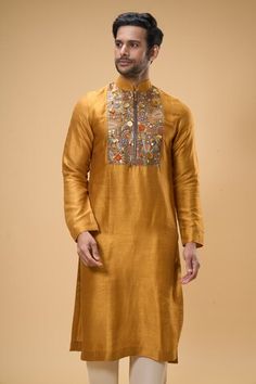 Yellow kurta with placed sequin embellished threadwork placket. Comes with pant. - Aza Fashions Ceremonial Slub Silk Kurta For Diwali, Slub Silk Kurta For Ceremonial Festivals, Ceremonial Slub Silk Kurta For Festivals, Gold Tussar Silk Kurta With Chikankari Embroidery, Festive Embroidered Tussar Silk Sherwani, Chanderi Kurta With Gold Embroidery Long Sleeve, Chanderi Long Sleeve Kurta With Gold Embroidery, Ceremonial Silk Kurta With Chikankari Embroidery, Festive Tussar Silk Kurta With Intricate Embroidery