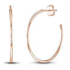 Luxurious round wires are polished to a high-shine in these glamorous women's hoop earrings. Fashioned in 14K rose gold, the 25mm earrings secure in place with friction backs. Rose Gold Hoop Earrings Shiny Finish, Rose Gold Hoop Earrings With Shiny Finish, Rose Gold Shiny Hoop Earrings, Rose Gold Polished Hoop Earrings, Rose Gold Hoop Earrings With Polished Finish, Rose Gold Polished Finish Hoop Earrings As Gift, Rose Gold Hoop Jewelry With Shiny Finish, Rose Gold Polished Hoop Earrings As Gift, Minimalist Rose Gold Hoop Earrings With Polished Finish