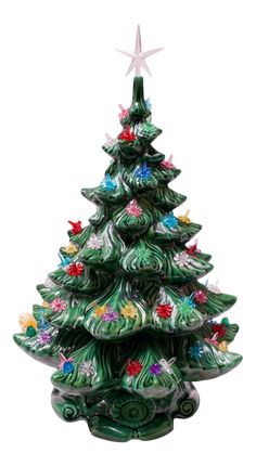 a ceramic christmas tree with stars on top