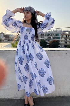 "DESCRIPTION blue boota floral printed long maxi dress / square neckline with smocked summer maxi dress / long sleeve boho maxi dress Indian (Jaipur) Traditional Hand Block Printed Dresses for summer vacations, beaches wear, party wear, and more occasions to wear this dresses. PRODUCT DETAILS: Long sleeve, square neck, Long dress FABRIC: soft and breathable cotton cambric WASH CARE:  wash in cold water, air dry in shade.. SLEEVE LENGTH - 22 inch Size chart is mentioned in images. Size chart is g Bohemian Maxi Dress With Elastic Sleeves For Spring, White Bohemian Maxi Dress With Square Neck, White Bohemian Square Neck Dresses, White Bohemian Dress With Square Neck, Fitted Maxi Dress With Square Neck And Elastic Sleeves, Casual Printed Maxi Dress With Square Neck, Bohemian Summer Maxi Dress With Elastic Sleeves, Casual Square Neck Printed Maxi Dress, Summer Square Neck Dress With Smocked Cuffs