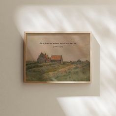 a painting hanging on the wall with a quote above it