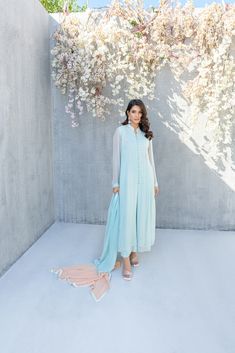 Embrace Simplicity and Sophistication with Hana Pakistani Designer Dress – Shireen Lakdawala Silk Maxi Palazzo Set For Wedding, Silk Maxi Length Palazzo Set For Wedding, Silk Palazzo Set For Wedding, Maxi Length, Elegant Chikankari Embroidery Anarkali Set, Maxi Length, Spring Anarkali Set In Georgette With Traditional Drape, Elegant Spring Anarkali Set With Traditional Drape, Spring Designer Wear Floor-length Palazzo Set, Reception Maxi Length Kurta With Sheer Dupatta, Designer Floor-length Palazzo Set For Spring