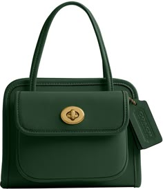 From COACH&#x2C; the Coach Originals 1968 Safari Glovetanned Tote features:Glovetanned leatherInside multifunction pocketMagnetic snap closure&#x2C; leather liningHandles with 3.25 dropOutside turn-lock pocketsDetachable chain strap with 22 drops for shoulder or crossbody wearApprox. 6.25 (L) x 5 (H) x 2.75 (W)The Coach OriginalsImported. Quiet Luxury Outfits, Flowy Fashion, Coach Fashion, Mary Jane Shoes Womens, Sneaker Dress Shoes, Pretty Bags, Women Men Shoes, Vintage Coach, Dillard's