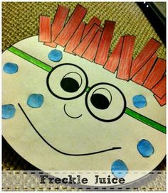 a freckle juice paper plate with toothpicks sticking out of it's face