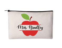 a white bag with an apple and the words mrs bradley on it