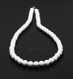 Product Details : ITEM : WHITE ONYX BEADED NECKLACE Item Code : DGC2085 Gemstone Name : WHITE ONYX Chain Style : BEADED Beads Shape : SMOOTH ROUND Beads Size : 8mm Approx Length : 18 INCH WITH LOBSTER CLASP Weight : 240 Cts. Approx Customization : **Available** Please Feel Free To Contact If You Have Any Query. White Faceted Bead Round Necklaces, White Round Necklaces With Faceted Beads, White Gemstone Beaded Round Necklaces, White Gemstone Beads Round Necklaces, White Gemstone Beads Necklaces, White Gemstone Beads Necklace, White Polished Beaded Round Necklaces, White Necklaces With Round Gemstone Beads, White Polished Beaded Necklaces