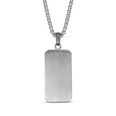 He'll love the ornate look of this dog tag necklace. Stainless steel Features a dog tag pendant with intricate details 24-inch box chain with lobster clasp Engraved Stainless Steel Rectangular Jewelry, Rectangular Stainless Steel Necklaces, Stainless Steel Dog Tag Necklace With Box Chain, Engraved Metal Dog Tag Jewelry, Rectangular Engraved Antique Silver Jewelry, Classic Rectangular Metal Necklaces, Silver Dog Tag Necklace With Lobster Clasp, Classic Engraved Dog Tag Necklace, Rectangular Engraved Jewelry For Father's Day