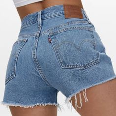 The Classic Denim Shorts, Levis 501 W26, Fly Button, Tattered Hem, High Waisted. Never Worn! Levi 501 Shorts, Vintage Levi Shorts, Levi Jean Shorts, Classic Denim Shorts, Black Jean Shorts, High Rise Denim Shorts, 501 Jeans, Denim Cutoff Shorts, Cut Off Jeans