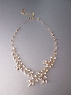 "This sparkly fun necklace is hand made using the Premium Quality European Crystal and comes in gold or silver finish. The necklace measures 22\" long and 1\" wide with the 6\" long extender. - This listing is for the necklace only  - If you would like to purchase the matching earrings please take a look here: https://www.etsy.com/listing/203769737/bridal-crystal-earrings-sparkly-crystal?ref=shop_home_active_1 * Special thanks to beautiful Erin and Jan Bon Jr. Photography for the last two photos Silver Gold-plated Necklace For Party, Metal Crystal Necklace For Wedding, Gold Rhinestone Costume Jewelry, Silver Gold Plated Bridal Necklace For Party, Gold Pendant Jewelry With Sparkling Stones, Silver Gold-plated Bridal Necklace For Party, Dainty Sparkling Necklace For Party, Elegant Gold Crystal Necklace, Dazzling Gold Jewelry With Sparkling Stones