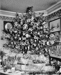 an old black and white photo of a christmas tree