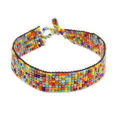 a multicolored beaded bracelet on a white background