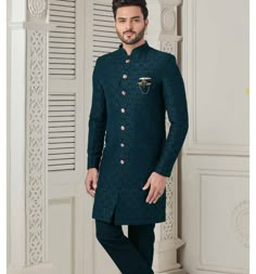 This is a premium sherwani Indo Western  by Golden Attire crafted from high quality fabric and imported materials. Our products are handcrafted by experienced tailors who make sure the that the stitching is precise, lining is proper and the overall product is sturdy enough to not go out of shape for more than a few years. Also all our products have extra margins in their length, sleeves, sides so it's easily alterable if your size changes after some time. To see more available colours and design Formal Green Sherwani With Pallu, Traditional Green Sherwani For Groom, Green Sherwani For Groom, Green Groom Sherwani, Blue Self Design Sherwani For Wedding, Green Self Design Sherwani For Wedding, Green Naqshi Sherwani For Wedding, Green Bandhgala For Groom - Eid Festival, Elegant Semi-stitched Sherwani With Self Design