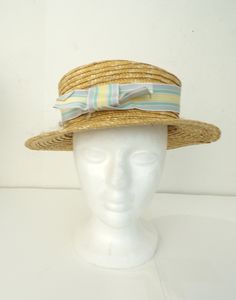 -Description- >boy's straw hat with striped bow ribbon >ribbon is blue, pink, green, yellow >cute hat! >condition: great >color(s): tan, blue, green, pink, yellow >fabric(s): straw >size: one size fits most -social media- instagram: @voguevibesvintage H#1 VVV0380 Retro Curved Brim Straw Hat For Beach, Striped Straw Sun Hat For Spring, Adjustable Brimmed Retro Boater Hat, Retro Adjustable Brimmed Boater Hat, Spring Striped Straw Sun Hat, Retro Summer Boater Hat, Retro Brimmed Boater Hat For Summer, Retro Summer Brimmed Boater Hat, Summer Retro Brimmed Boater Hat