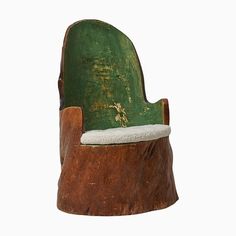 a wooden chair with a green seat and white cushion on it's back end