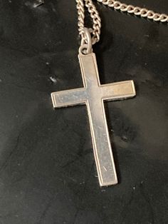 925 Sterling silver plain religious cross pendant necklace on chain Pendant height 4 cm   Total Weight 4 grams  Chain length  45 cm   All my silver is hallmarked /stamped and unpolished ... it will come with a silver polishing cloth. If you would like it dip cleaned before posting please let me know in the message section.  This is my sole small business .. I post daily and combine postage. All purchases come with full Etsy cover .. I am an established Etsy star seller and have sold over 20,000 items with 5 star reviews so please buy with confidence and ask any questions   Kind regards and thanks for looking  yours nostalgically Karen at LaLa ( loved and loved again ) xx Silver Crucifix Necklace With Polished Finish, Silver Cross Necklace Stamped 925, Silver 925 Stamped Cross Necklace, Silver 925 Stamped Cross Pendant Necklace, Hallmarked Silver Cross Pendant, Silver Hallmarked Cross Pendant, Hallmarked Sterling Silver Cross Necklace, Hallmarked Silver Cross Necklace, Silver Hallmarked Cross Necklace