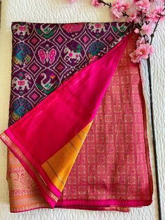 The hallmark of a Patola Silk Sari lies in its rich and vibrant colors, intricately woven motifs, and geometric designs that reflect the cultural heritage of Gujarat's Patan region. These motifs often include traditional symbols such as flowers, animals, birds, and religious motifs, each carrying its own significance and symbolism. Made from pure silk, the Patola Sari exudes a luxurious sheen and a soft, smooth texture that drapes gracefully around the body. Its lightweight yet durable fabric ma Artisan Dupatta With Motifs For Festivals, Designer Multicolor Saree For Festivals, Artisan Handloom Dupatta For Festivals, Designer Traditional Wear For Ceremonies And Festivals, Traditional Multicolor Zari Weaving Wear, Traditional Multicolor Wear With Zari Weaving, Traditional Multicolor Traditional Wear With Zari Weaving, Traditional Banarasi Silk Dupatta As Gift, Traditional Banarasi Silk Dupatta For Gift