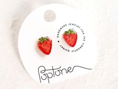 🍓 Nothing says "summer" like biting into a delicious red strawberry, and these bright red strawberry earrings add the perfect touch to a cute summer outfit. 🙌 Each earring is handmade and hand-illustrated, ensuring that no two are exactly alike. The earrings are coated in glossy resin and made with super hypoallergenic nickel-free titanium earring posts - perfect for people with metal sensitivities! 💧 These earrings are highly water resistant, but please care for them by removing before showe Earrings Strawberry, Strawberry Earrings, Kawaii Fruit, Strawberry Summer, Cute Summer Outfit, Fruit Earrings, Titanium Earrings, Strawberry Fruit, Cute Strawberry