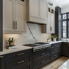 a kitchen with marble counter tops and black cabinets