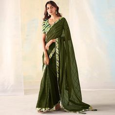 Mehendi Green colored saree is made from georgette fabric which is highlighted with beautiful weaving with fancy lace border & tassels as shown. comes along unstitched digital printed banglori silk blouse piece which you can customise as per your design/style. Occasion - You can buy this saree for party and functions. Note:- The actual product may differ slightly in color and design from the one illustrated in the images when compared with computer or mobile screen. Measurements: Saree : Georget Saree With Lace Border, Saree For Party, Baby Skin Care, Mobile Screen, Silk Lehenga, Georgette Saree, Georgette Fabric, Lace Border, Georgette Sarees