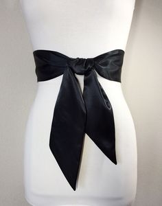 "Black Satin Sash Solid Black Sash Belt Wedding Dress Sash Black Dress Sash Cocktail Dress Belt Bridesmaid Sash Satin Swank This Satin Swank® reversible waist sash is the perfect finishing touch for your bridesmaid, wedding, or special occasion dress, or just the right piece to add instant polish to your dress or top. Depending on your waist size and the length you choose (60, 75, and 90 inch lengths available), you can wrap the sash around your waist once or twice. You decide whether to tie the Black Tie-back Dresses For Black-tie Events, Black Dresses For Black-tie Events With Tie Back, Black Satin Dress With Satin Bow, Elegant Fitted Sash With Bow, Fitted Chic Sashes For Formal Occasions, Elegant Black Dress For Black Tie Occasion, Fitted Chic Formal Sashes, Formal Fitted Sash With Tie Back, Fitted Ribbon Sashes For Evening